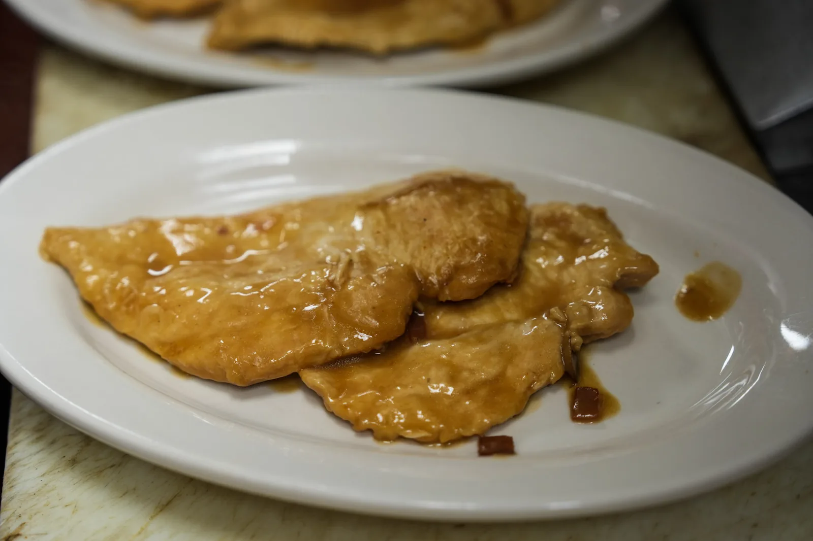 Chicken francese cutlets in lemon butter sauce at Ciminelli's in Bethpage