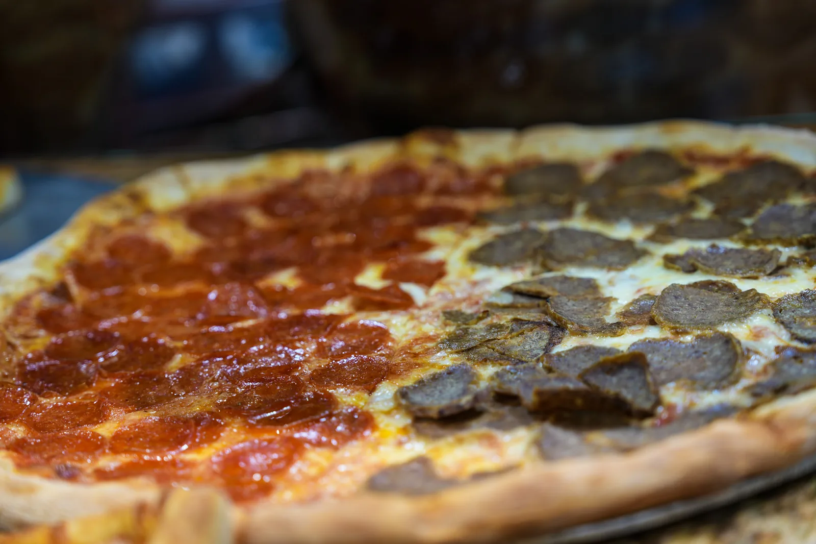 Half pepperoni, half meatball pizza at Ciminelli's Pizzeria in Bethpage